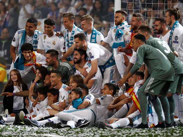 Real Madrid celebrate winning the Champions League Final