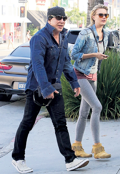 Микки РУРК уверяет, что таких чувств, как к Насте МАКАРЕНКО, не испытывал с юности. Фото: © Splash News